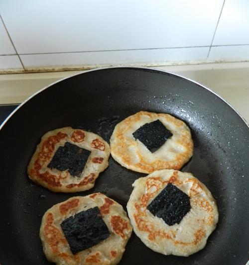 猪肉圆葱馅饼制作技巧（美食在家，轻松手制饼皮和馅料）