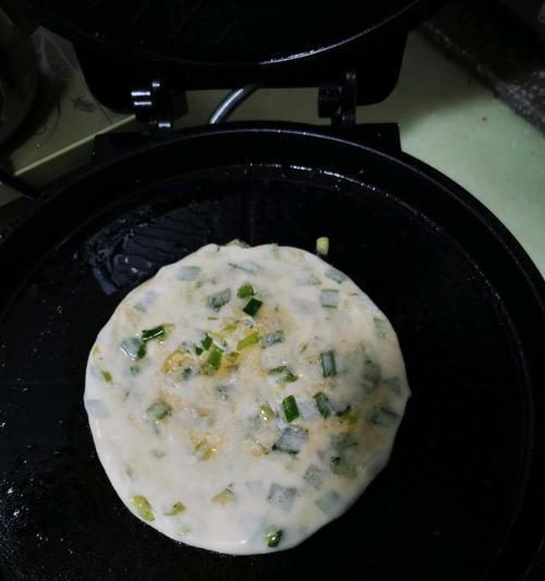 香酥葱花饼的制作方法（用最简单的步骤做出美味的葱花饼）