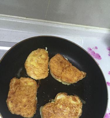 肉煎蛋的制作方法（如何做出口感鲜美的肉煎蛋）